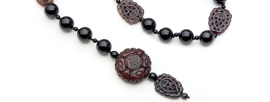 Gloria necklace: Onyx, carved Burma jade pendant and ornaments lariat.