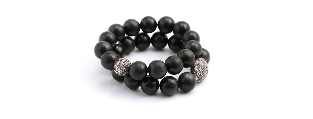 Diamond Pavé bracelet: Obsidian bracelets, champagne diamond pavé ornaments.