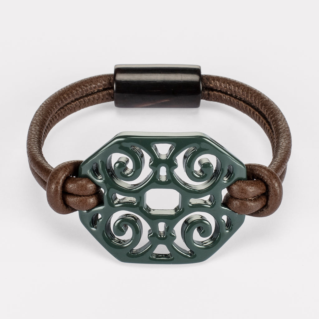 Elena bracelet: Carved Artdeco bracelet in natural buffalo horn. Color: ocean..