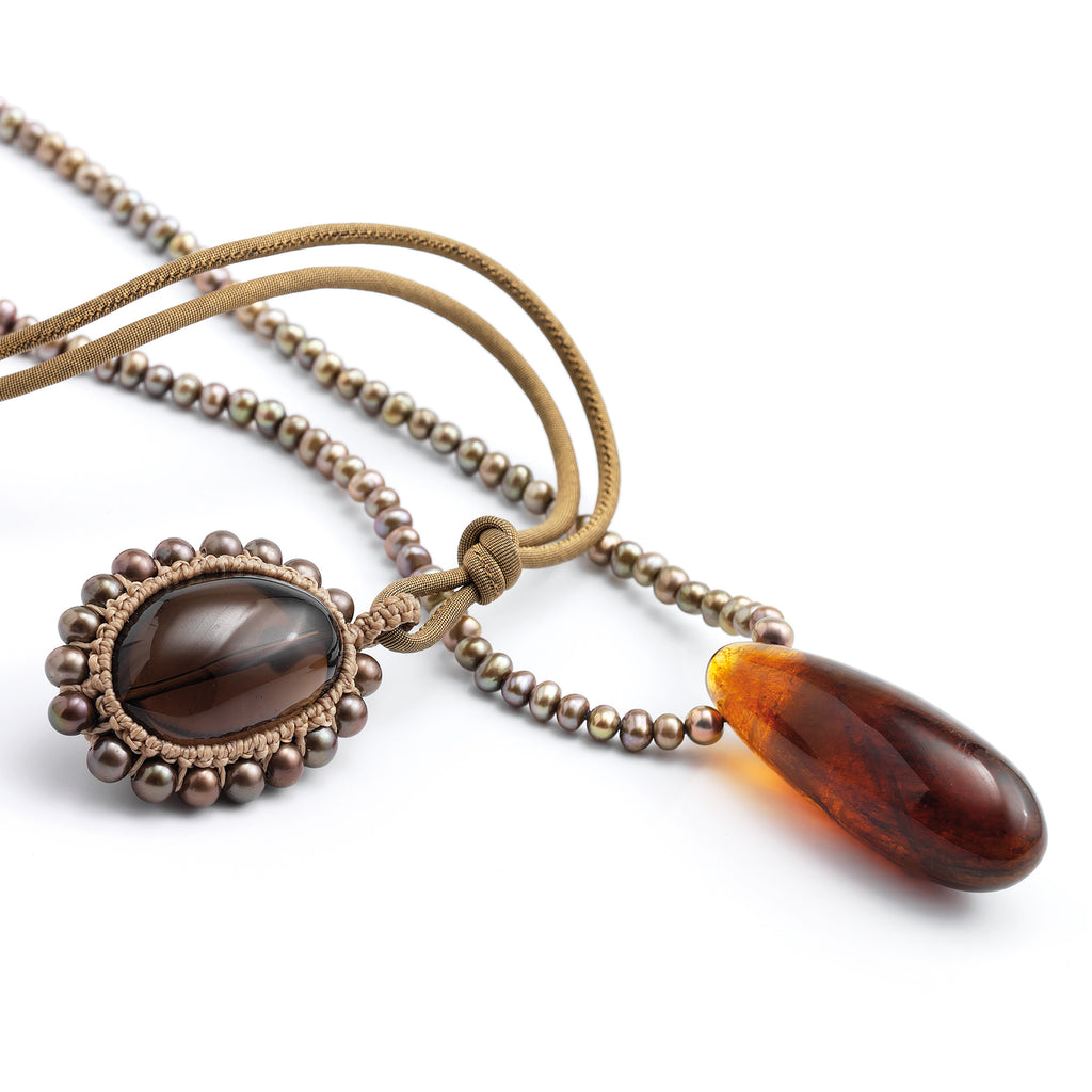 Smoky Quartz Macrame, Amber Pearls: Smoky quartz oval and pearls macrame pendant on a silk band. Drop shaped Dominican amber pendant on fresh water pearls necklace.