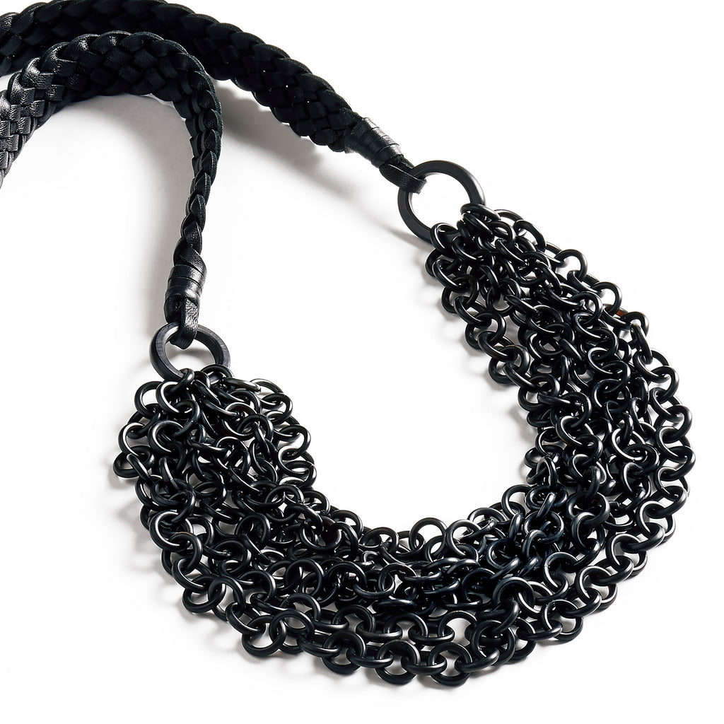 Braided Waterfall: Multi strand black buffalo horn necklace. Braided Nappa leather band.
