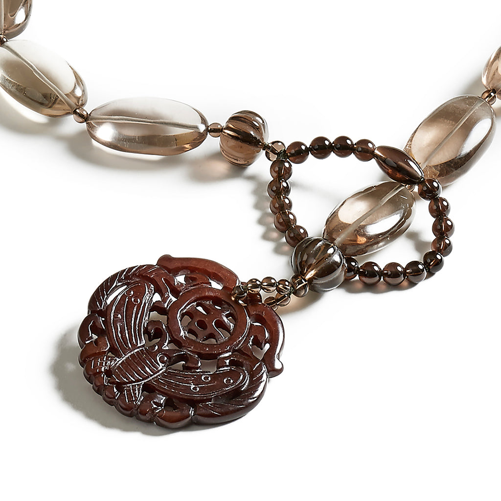 Fog necklace: Smoky quartz ovals, carved Burma jade pendant and ornaments lariat.
